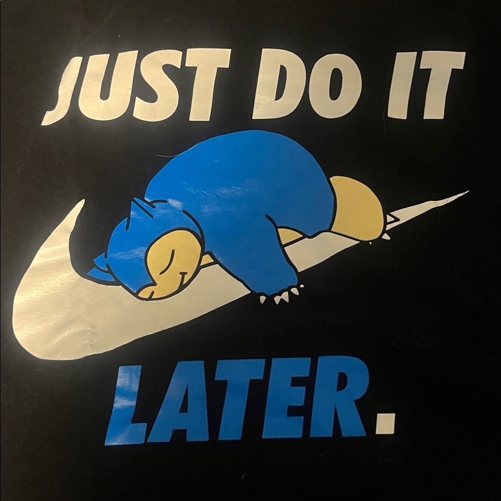 Nike Black Tee with White Swoosh and Blue Snorlax Graphic
